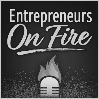 "Entrepreneurs On Fire" podcast graphic — a microphone with flames rising from it against a dark, speckled background.